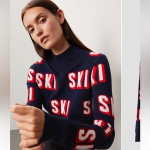PERFECT MOMENT
Wool jacquard turtleneck sweater